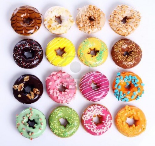 9000288-colorful-and-tasty-donuts-on-white-background